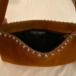Yvonne Christa New York suede bag with pearls sew around the side.